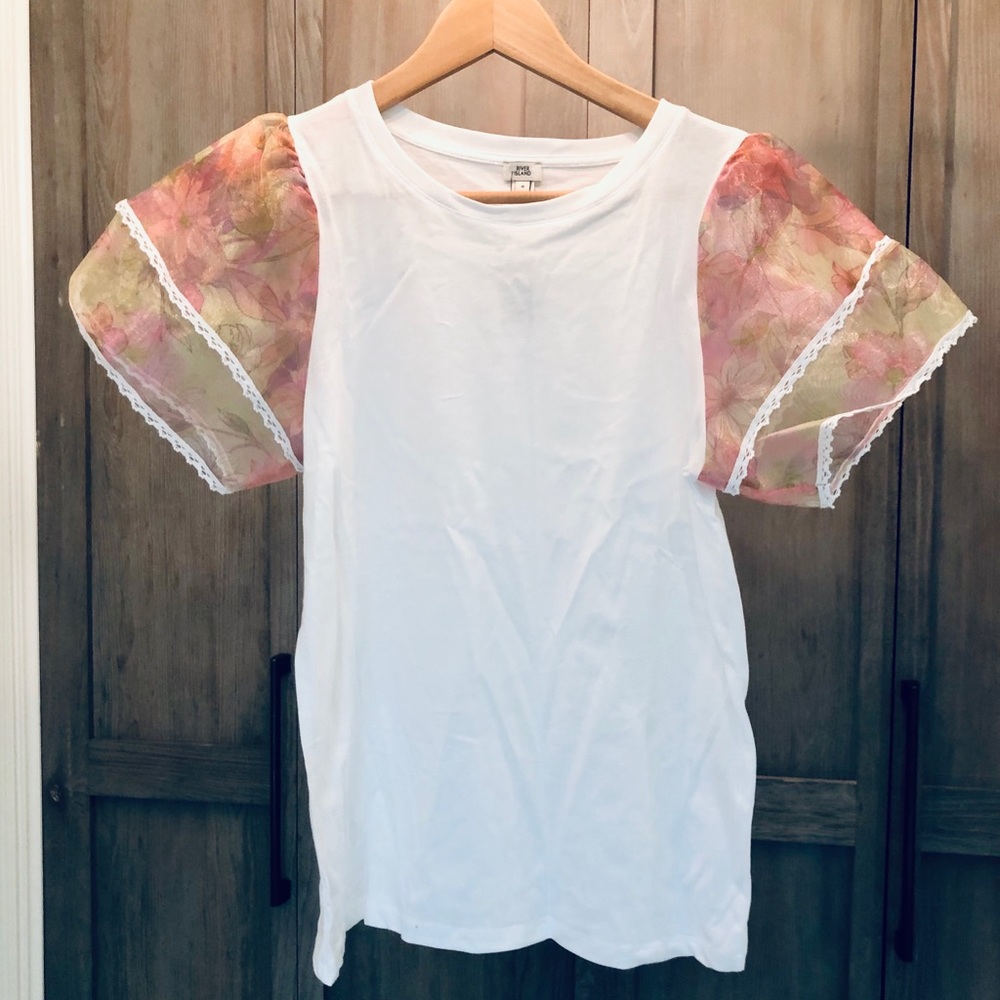 T with floral sleeves.